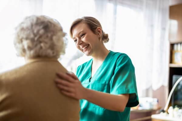 elderly person with a nurse